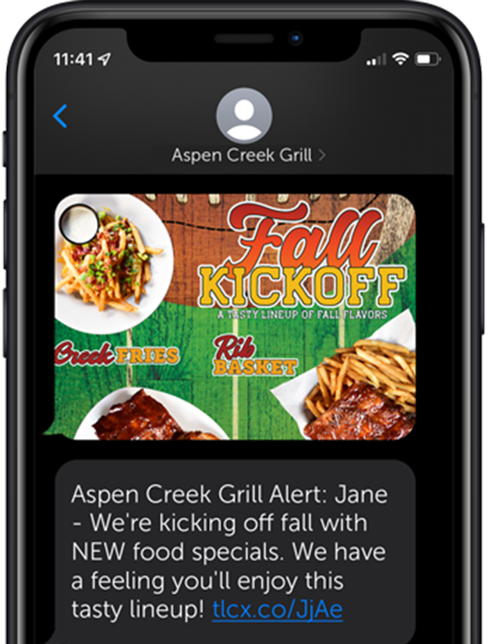 close up of a phone displaying a text message for new food specials at Aspen Creek Grill
